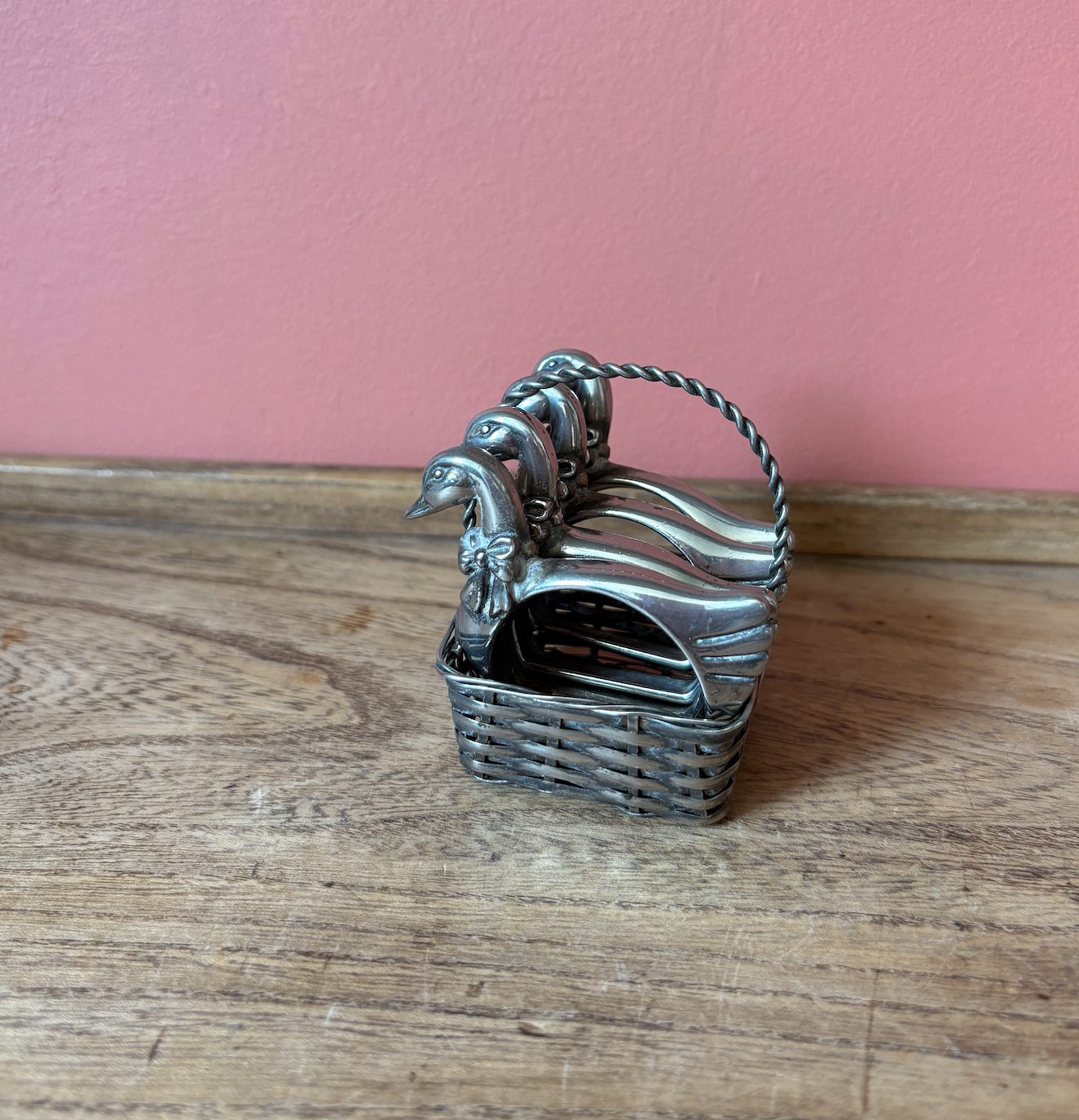 Set of 4 Silver Plate Good Napkin Rings in basket