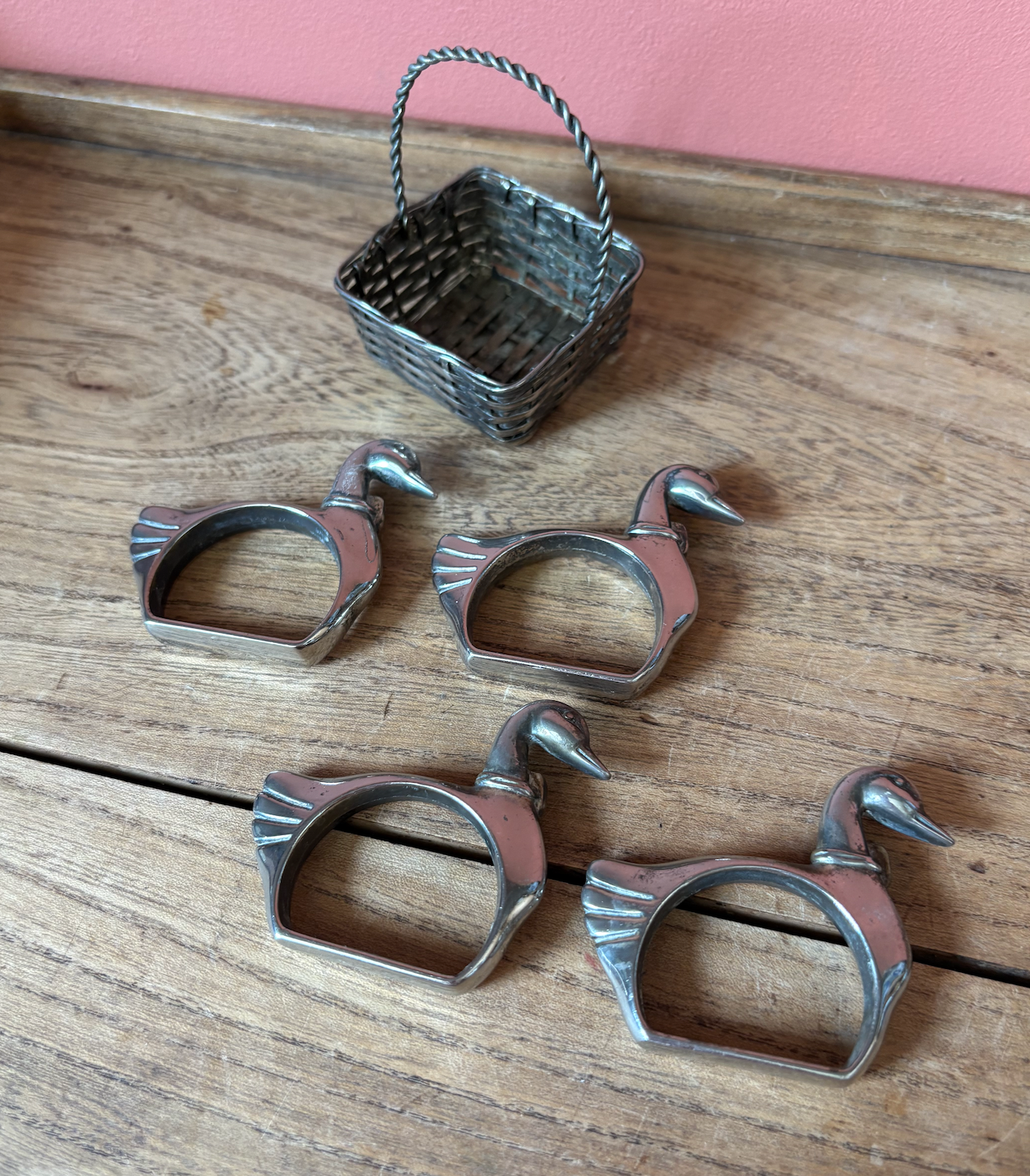 Set of 4 Silver Plate Good Napkin Rings in basket
