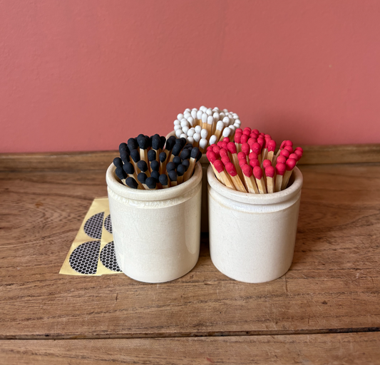 Beige Ceramic Pot with colourful Matches