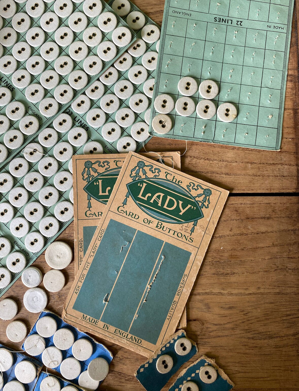Selection of English White Linen & Brass Buttons