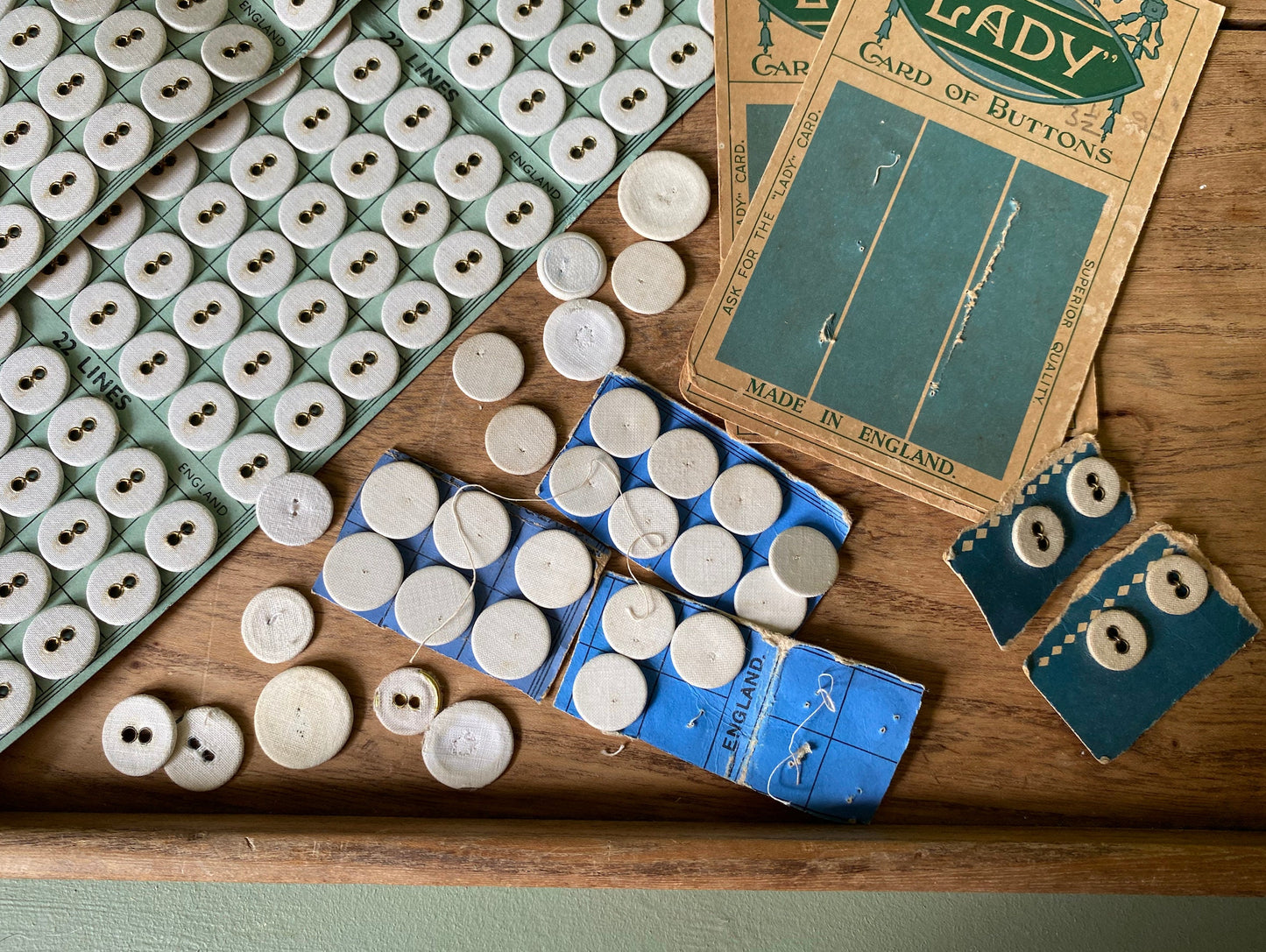 Selection of English White Linen & Brass Buttons