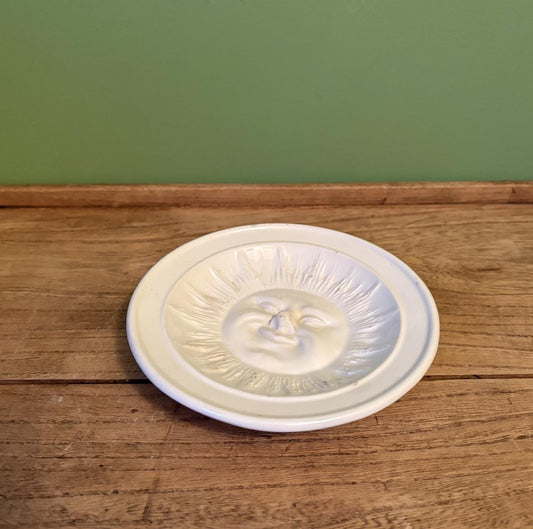 White Ceramic Dish Featuring 3-D Sun Motif